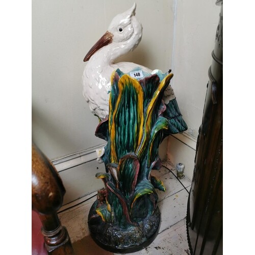 Ceramic majolica jardiniere decorated with a stork and folia...
