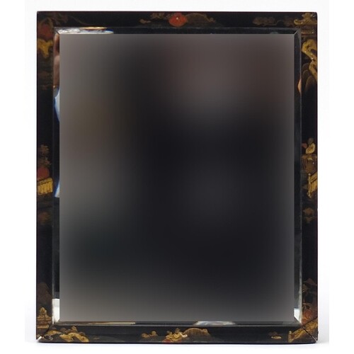 Chinoiserie black lacquered wall mirror decorated with figur...