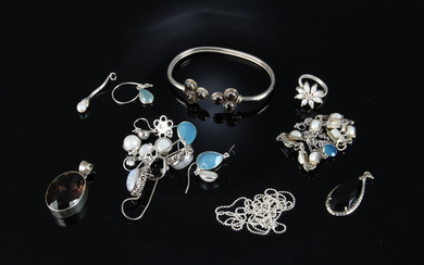 Collection of sterling silver jewelry with precious stones (21)