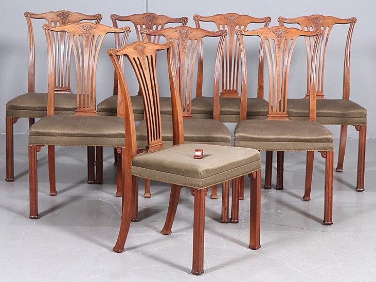 Danish cabinetmaker: Set of eight mahogany chairs with profiled legs, carved with stylized ornaments. H. 95 cm. (8)