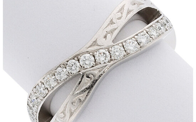 Diamond, Platinum Band The band features full-cut diamonds weighing...