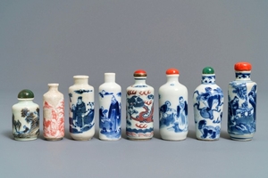 Eight Chinese blue, white and underglaze red snuff…