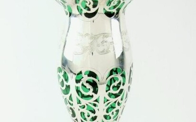 Emerald Glass Vase - An emerald glass footed vase...