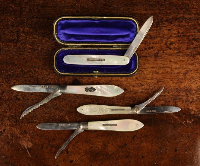 Four Mother of Pearl Handled Silver Fruit Knives: One in a velvet lined case; the blade hallmarked S