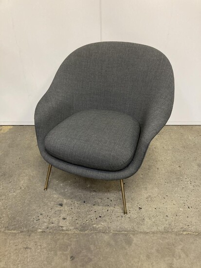 NOT SOLD. GamFratesi: "Bat" lounge chair upholstered with dark grey fabric, with brass legs. Manufactured by Gubi. H. 82. W. 85 cm. – Bruun Rasmussen Auctioneers of Fine Art