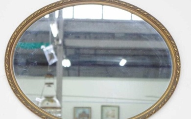 Gilt framed oval mirror