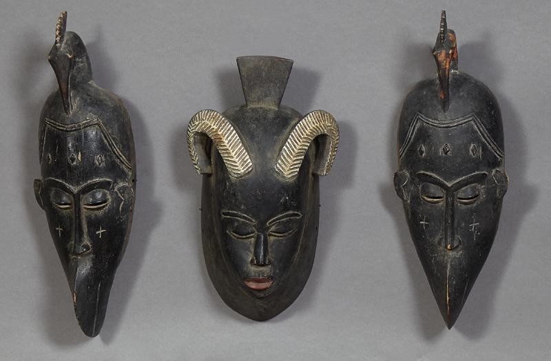 Group of Three African Carved Wood Masks, 20th c., one