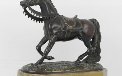 HORSE in bronze with patina on a gilt...
