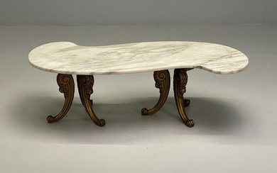 Italian Neoclassical Marble Coffee TableTwo gilt carved pedestals supporting a large kidney shaped