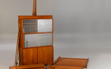 KAI KRISTIANSEN. FM Furniture. Teak shelving system. Denmark, 1960s. 27 pcs.