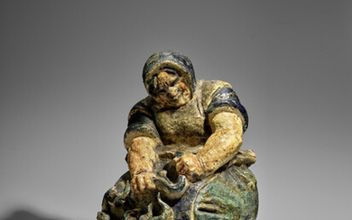 KNUD KYHN (1880-1969) Woman with Eelshand formed, hand glazed sculpture, incised 'KK'height 22in (56cm); width 16in (41cm)