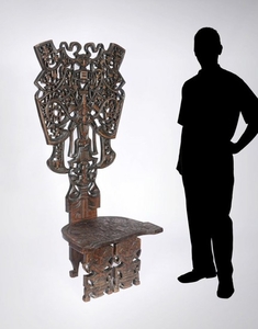 LARGE CARVED AFRICAN CHAIR