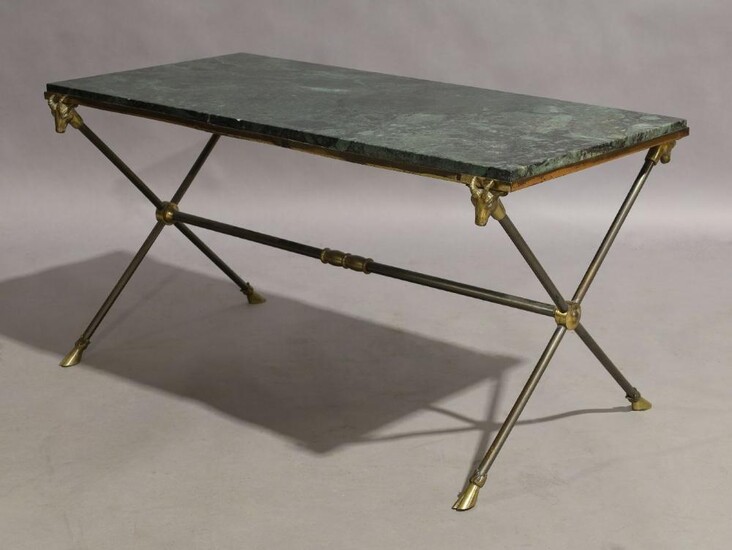 Manner of Maison Jansen, a French coffee table, circa 1960, the rectangular green marble top on gun metal and brass supports with rams head terminals on hoof feet, 44cm high, 85cm wide, 45cm deep