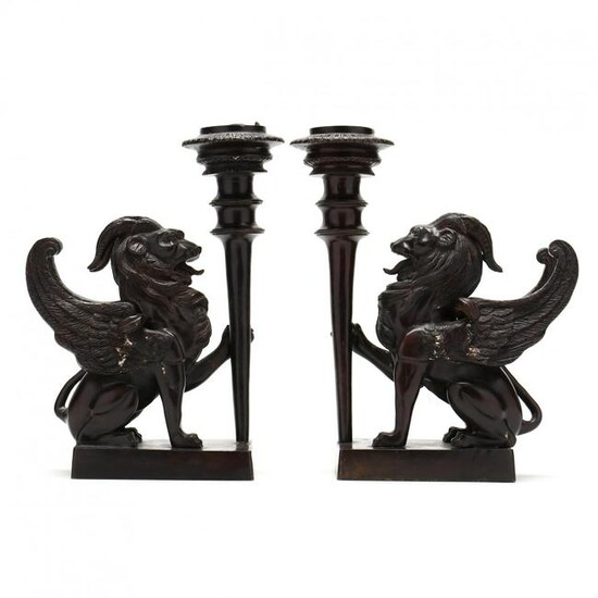 Pair of Bronze Candlesticks Held by Mythical Creatures