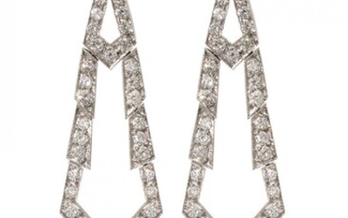 Pair of long earrings with movement in platinum. Model of sleek geometry, articulated, with brilliant-cut...