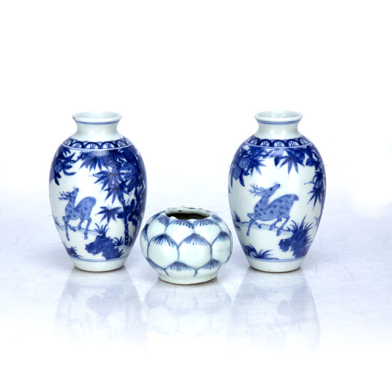Pair of small blue and white vases