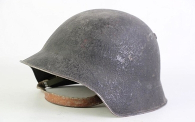 Possibly WW2 Army Helmet