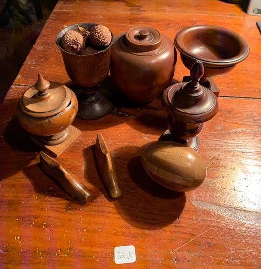 Set of eight turned wooden pieces: cups, covered...