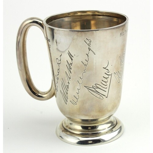 Silver christening mug with various facsimile signatures eng...