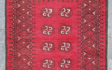 Small Woollen Turkoman, in red and black - Made by Hali Handmade Carpets (110 x 75cm)