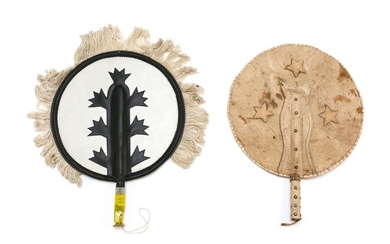 TWO UNIQUE LARGE COWBOY OR AFRICAN FIXED HAND FANS 1) Double-sided. Possibly cowhide, with three applied stars and rivet decoration....