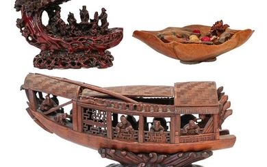 A Chinese carved wooden model of a boat, 34cm,...