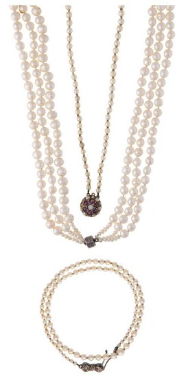 Three cultured pearl necklaces, one fresh water cultured (3) the first a double graduated row to a gold, amethyst and seed pearl cluster clasp, length 62cm; the second a single graduated row to a marcasite cluster clasp, length, 38cm and a...