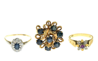 Three gem-set dress rings.