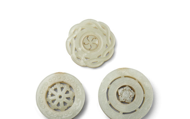 Three jade circular plaques undercut with movable roundels