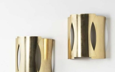 Two semi-cylindrical wall lamps in brass foil. Italy
