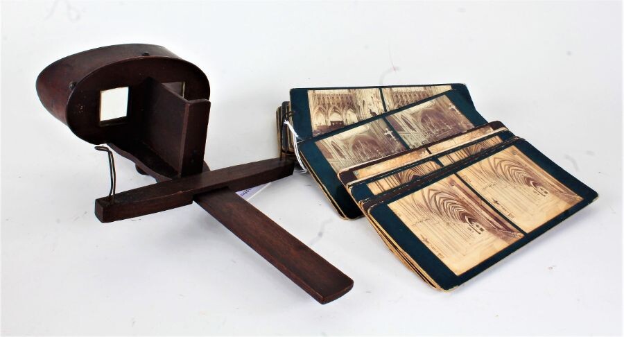 Wooden stereoscopic viewer, with a small collection of cards