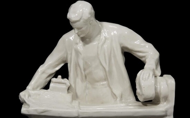 A Soviet porcelain group "Workman at the lathe" attributed...