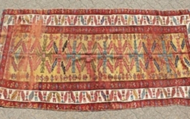 AN OLD CAUCASIAN RUNNER with typical motifs within a