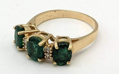 14K Gold Ring with Emeralds. 2dwt. Size 7