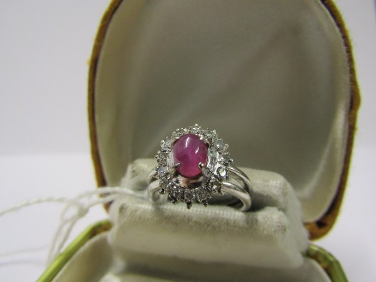 18CT WHITE GOLD DIAMOND & RUBY CLUSTER RING, principle caboc...
