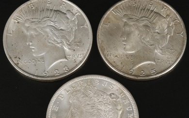1921 Morgan Silver Dollar and a 1923 and 1925 Peace Dollars