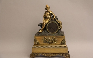 Pendule en bronze et tôle doré et patiné à décor d…