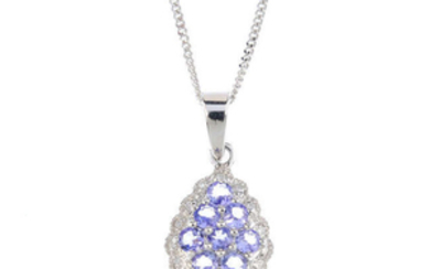 A 9ct gold tanzanite and diamond cluster pendant, with chain.