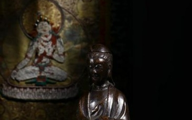 A BAMBOO CARVED GUANYIN STATUE