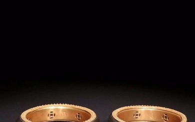 PAIR OF CHENXIANG WOOD EMBEDDED GILT SILVER BANGLE