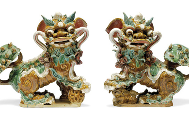 A PAIR OF CHINESE GLAZED STONEWARE BUDDHIST LIONS, GUANDONG, 19TH CENTURY