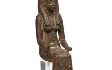 An Egyptian bronze seated figure of Isis,...