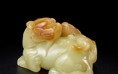A fine yellow and russet jade 'lion and cub' group