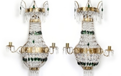 A pair of fixtures for candles, each with 2 sockets