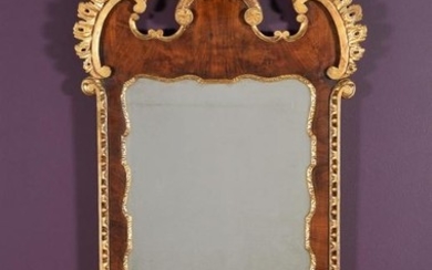 A George II walnut and parcel gilt wall mirror