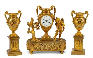 A Louis XVI Style Gilt-Bronze Three-Piece Clock