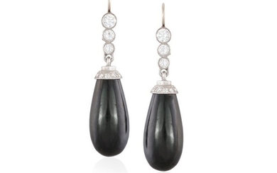 A PAIR OF ONYX AND DIAMOND PENDANT EARRINGS, FIRST…