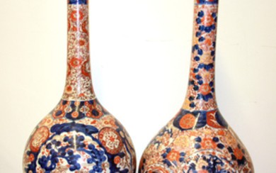 Two large 19th Century Japanese Imari bottle vases, H. 61cm.