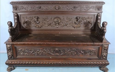Very early lift top bench, heavily carved