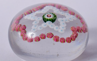 AN ANTIQUE FRENCH CLICHY STAR FORM MILLEFIORI GLASS